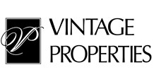 A black and white logo for vintage properties.